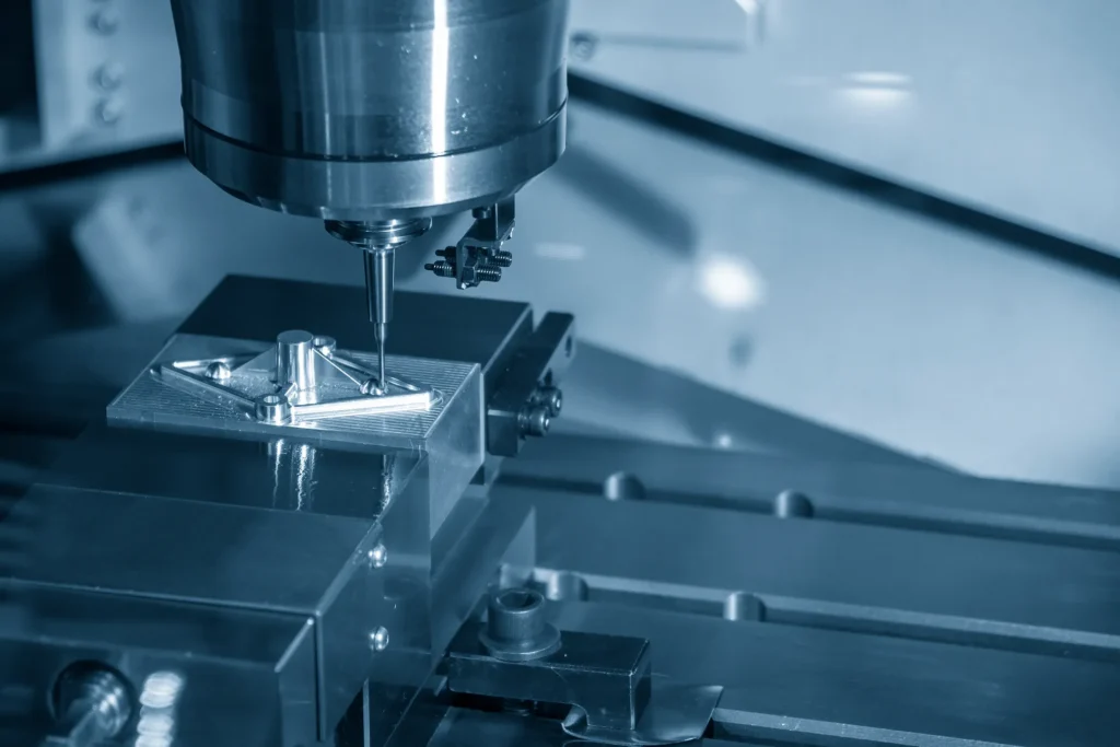 5-axis CNC machine precisely shaping a metal component.